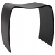 Black low stool or pouf in painted wood