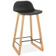 Solid and design black bar stool with beech legs and metal footrest