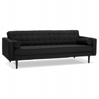 Sober and comfortable black sofa in Scandinavian style with interchangeable black or wood-colored feet
