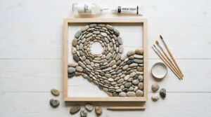 Faire un tableau avec des galets pour améliorer sa déco