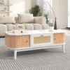 Table basse en rotin blanc avec tiroirs
